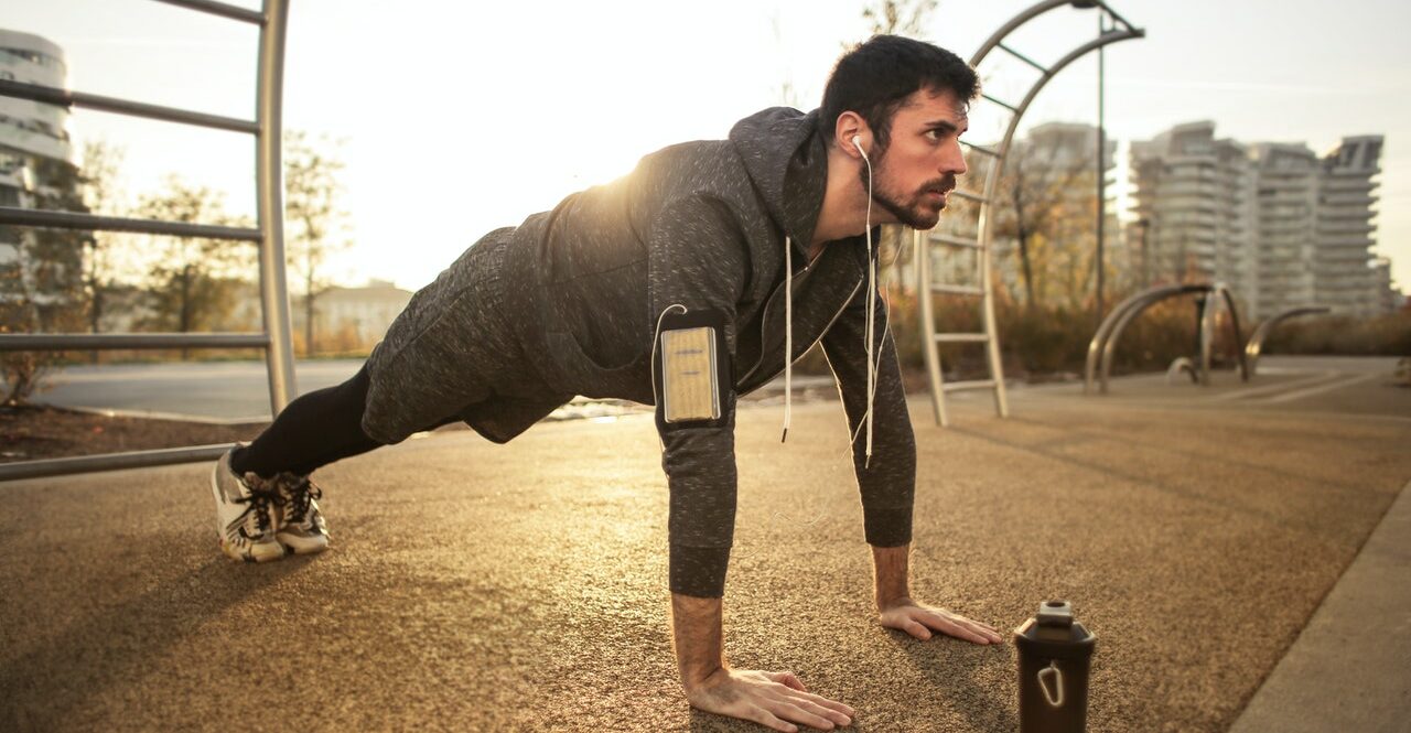 man doing pushups | does metformin lower or increase testosterone