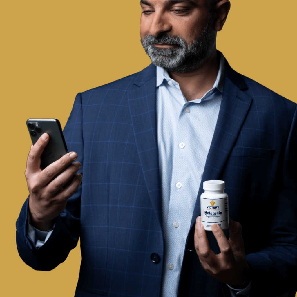 How much melatonin should I take? | man holding melatonin bottle and phone